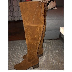 Thigh high laced tan boots
